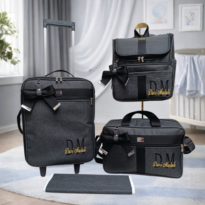 kit de bolsa de maternidade com mala de rodinha e mochila dois em um preto com faixa preta.