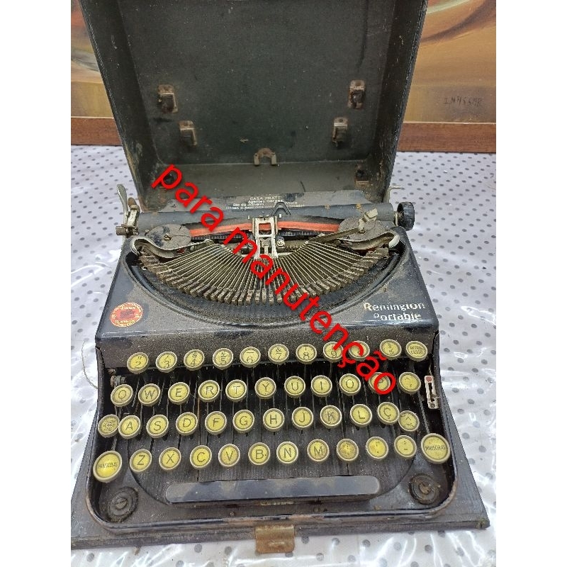 Máquina de escrever ano 1928 Ramingion Portable ( leia descrição)