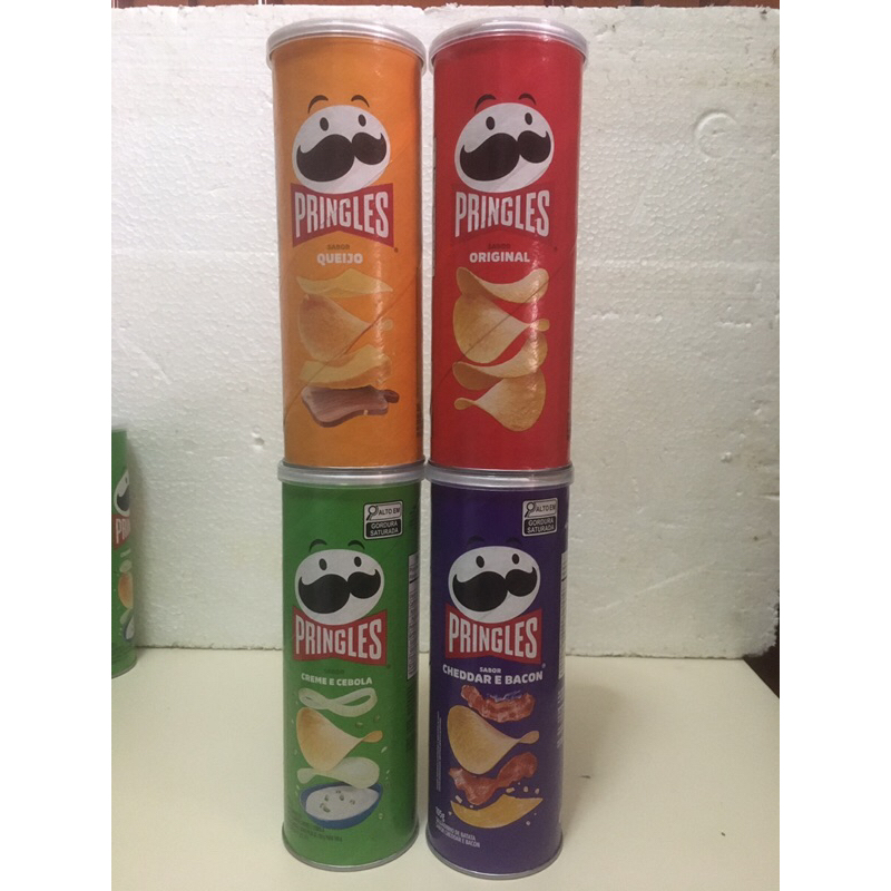 Quatro latas vazias Pringles para coleção