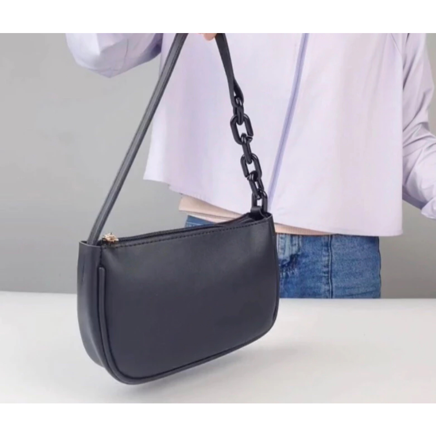 Bolsa de axila e ombro, Baguete feminina