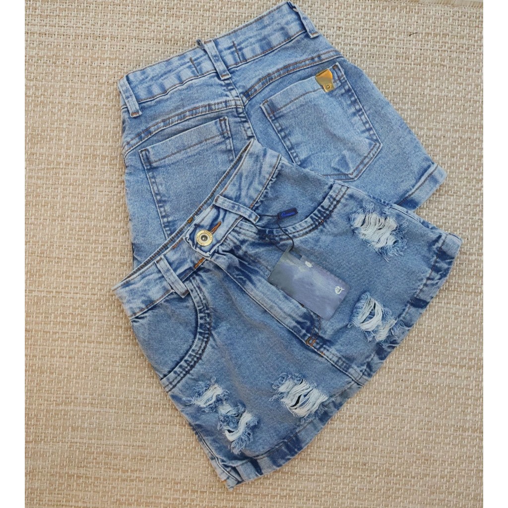 Short saia marmorizado claro puído Short saia jeans feminino claro detonado cronicas jeans