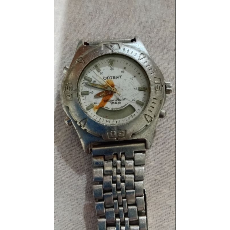 RELÓGIO ORIENT MBSSA 007 ZFM-195 PARA CONSERTO PULSEIRA NÃO É ORIGINAL PONTEIROS NÃO GIRA MAS A TIGE GIRA MAS NÃO GIRA O