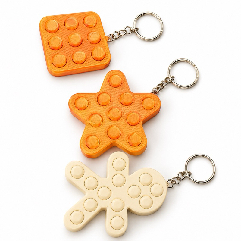 Chaveiro Fidget Plástico Bolha - Brinquedo Sensorial Divertido - Premium