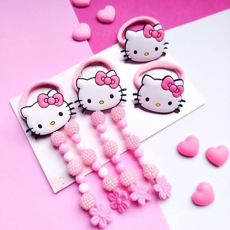 Xuxinha Hello Kitty I Laço de cabelo infantil parzinho com tererê em Oferta na Shopee