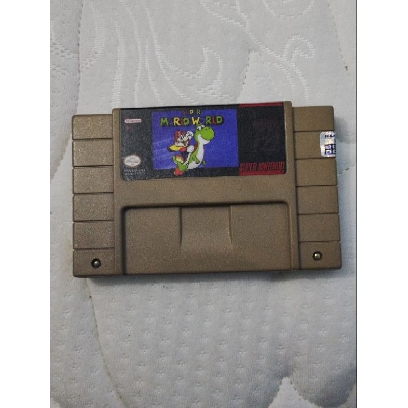 Fita do Mário World Original ( Super Nintendo) Funcionando perfeitamente.