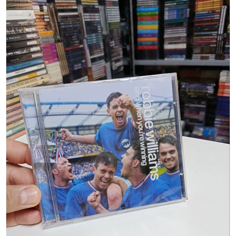 CD - ROBBIE WILLIAMS - ( SING WHEN YOU'RE WINNING )