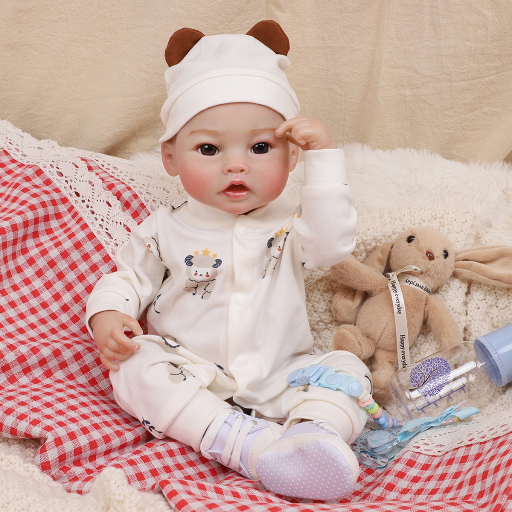 Boneca Bebê Reborn Silicone 48cm Menino Olho Castanho Peso Natural BRASTOY