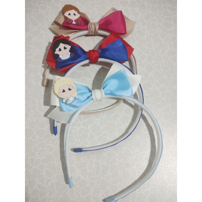 Kit 3 Tiaras Infantis com Laços de Princesas – Frozen, Branca de Neve e Anna