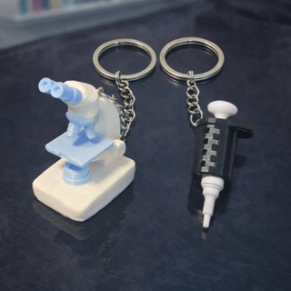 Kit  Chaveiro Micropipeta+ Microscópio kit de Chaveiros científicos em Oferta na Shopee