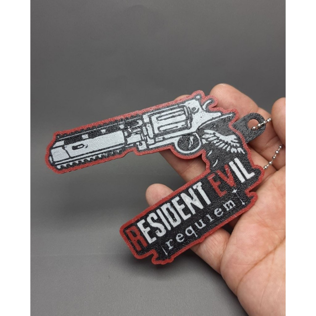 Resident Evil 9 Requiem Chaveiro Leon S Kennedy Grace Capcom 12cm
