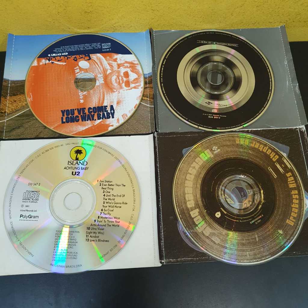 4 CD - Cds U2 + Fat Boy Slim + Backstreet Boys + Jon Bon Jovi - Mídias + Contra Capas - LER