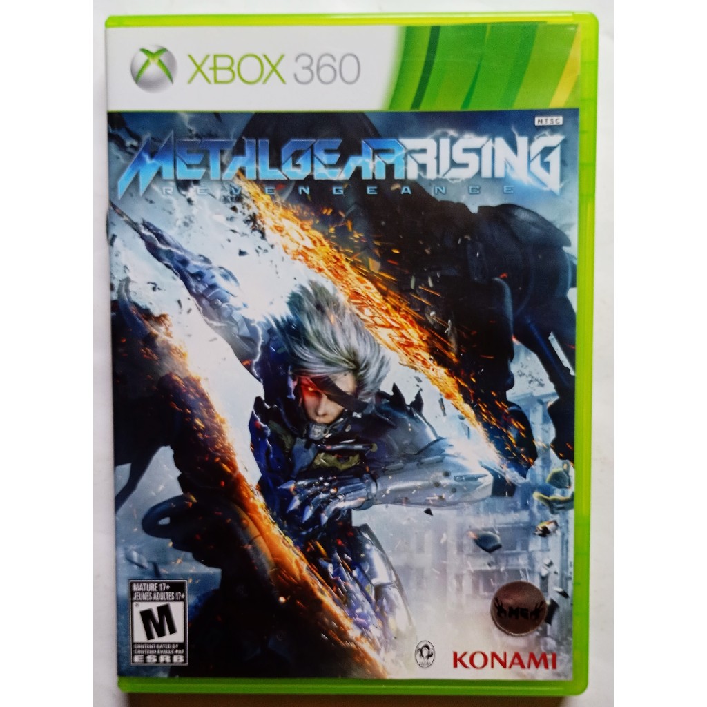 JOGO METAL GEAR RISING REVENGEANCE ORIGINAL XBOX 360 MIDIA FISICA CD.