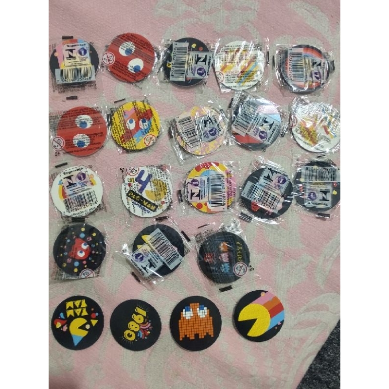 Lote 22 tazos pacman 18 lacrados