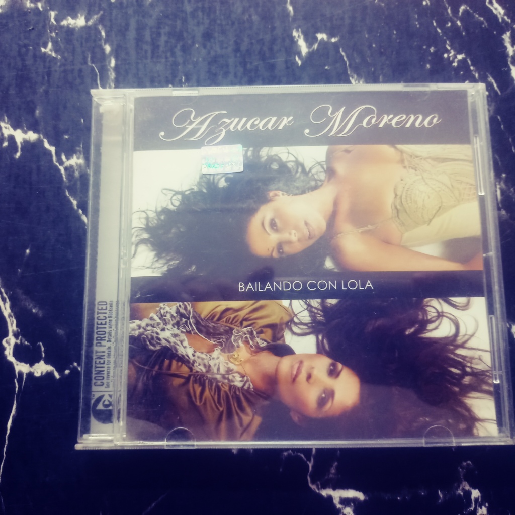 AZUCAR MORENO ( BAILANDO CON LOLA ) CD IMPORTADO RARO