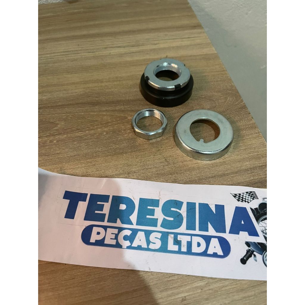 PORCA DA COLUNA DE DIRECAO +ARRUELA TRAVA COLUNA POP110I ES 2025