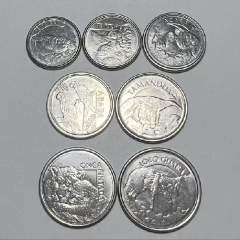 lote 7 moedas da fauna incluído lobo e onça datas variadas