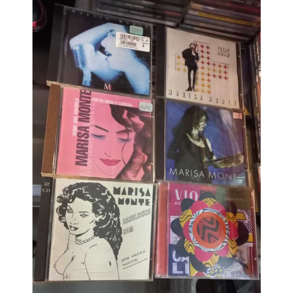 Cds marisa monte a sua mais universo ao meu redor barulinho bom verde anil rosa e carvão comida