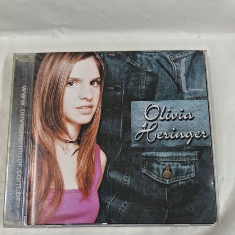 CD- OLIVIA HERINGER=TRUQUE DE PAIXÃO ( USADO) LEIA A DESCRIÇÃO