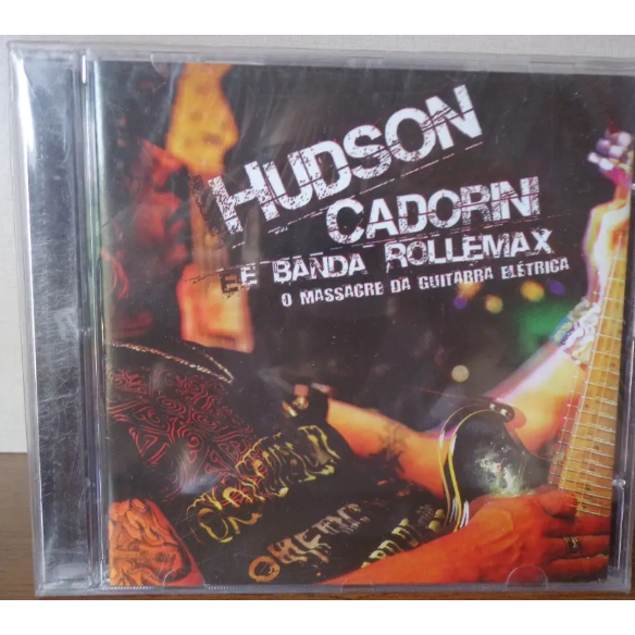 Cd Hudson Cadorini E Banda Rollemax O Massacre Da Guitarra ROCK ORIGINAL LACRADO