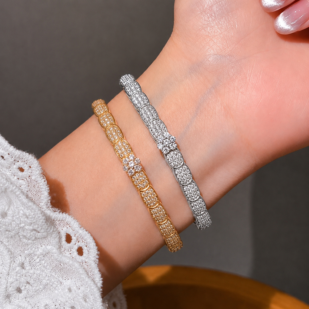 Pulseira feminina luxuosa com um requintado design de espiga de trigo, cravejada com zircônias cúbicas e banhada a ouro