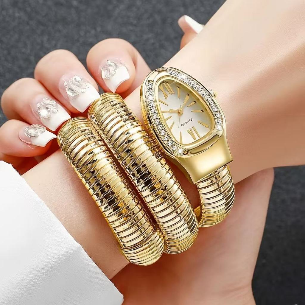 "Relógio Feminino Dourado ou Prata  com Pulseira Cobra - Design Escultura Remosú "