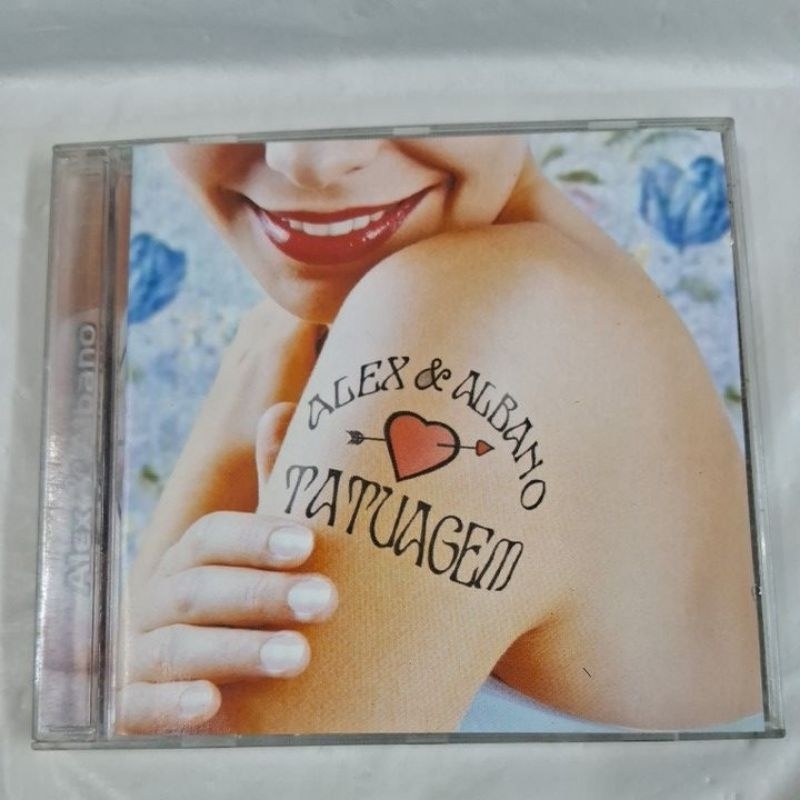 CD-ALEX & ALBANO = TATUAGEM ( USADO) LEIA A DESCRIÇÃO