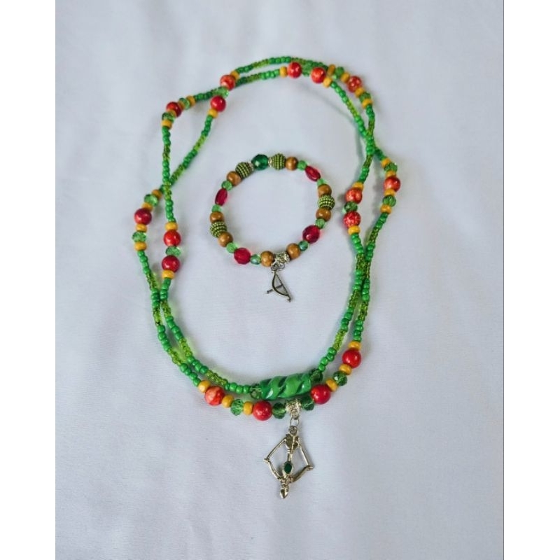 Guia verde vermelho madeira flecha Oxossi Caboclo Cabocla Sete flechas Cobra coral Rompe mato Jussara Umbanda Candomblé