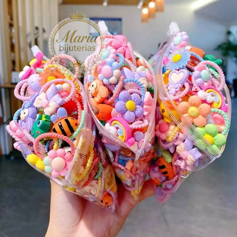 Kit com 20/40 peças Xuxinha elástico rabico de Cabelo infantil colorida  frutinha /Princesa/Flors mais batato em Oferta na Shopee