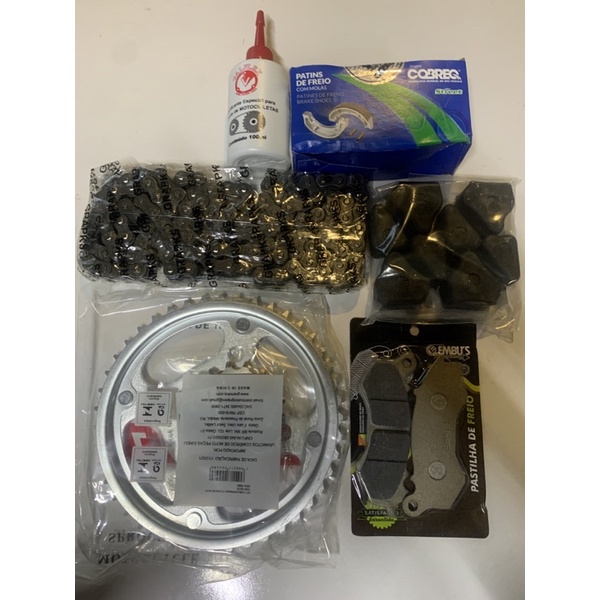 Kit Relação Transmissão Aço 1045 + Lona Cobreq+Coxim da Coroa+Óleo p/Corrente+ Pastilha CG 150 2014/2015/2016 CBS Titan