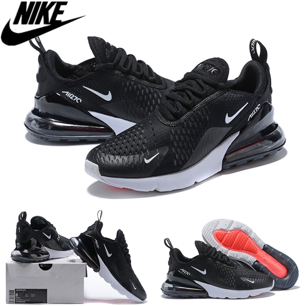 air max preto com pinta branca