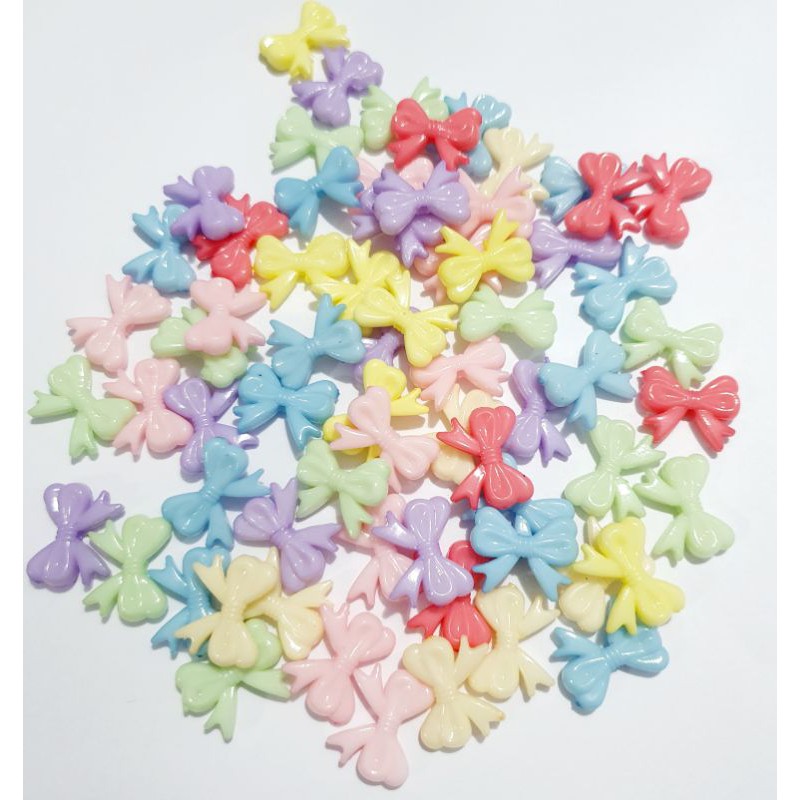 Miçangas Laços 22x29mm 50 Peças. em Oferta na Shopee