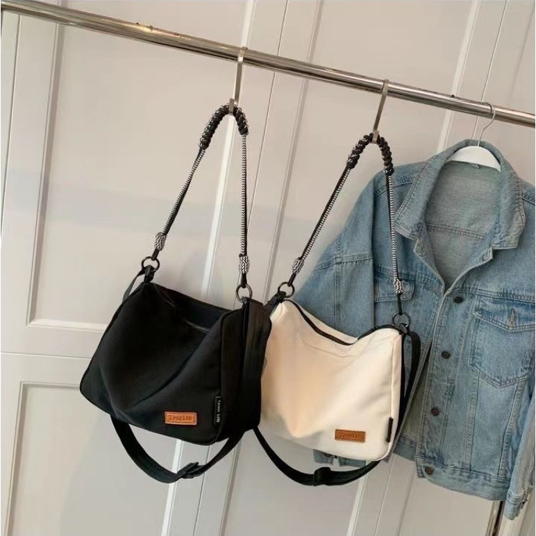 Bolsa de ombro crossbody de estudante de lona impermeável de nylon em Oferta na Shopee