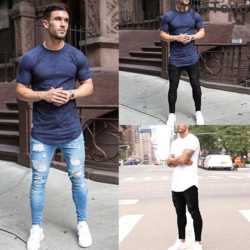 homens de calça jeans justa
