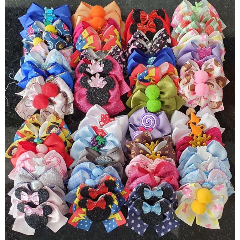 Kit de Laços Pet Para Femea 10,20, 30 e 40 unidades Banho e Tosa Pet Shop Lacinhos Luxo Cachorro em Oferta na Shopee