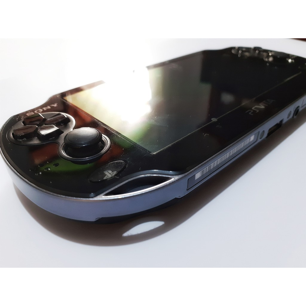 Ps Vita Sony original completo tela OLED!!! + 8 Jogos Escorrega o Preço