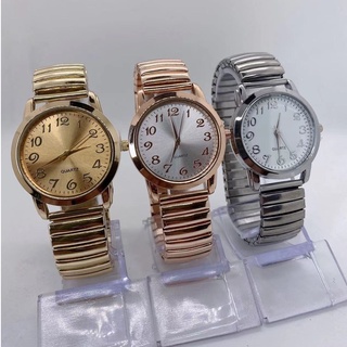 Relógio Feminino de pulso Quartz Pulseira Elástica analógico Redondo Dourado e Rose breto…