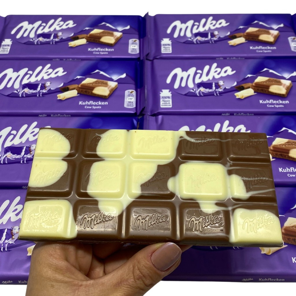 Milka Cow Spots - Mesclado chocolate ao leite e chocolate branco - Importado 100g