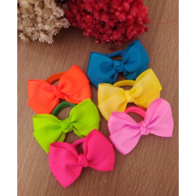 Laço/Lacinho Cruzado na Xuxinha ou Bico de Pato em Oferta na Shopee