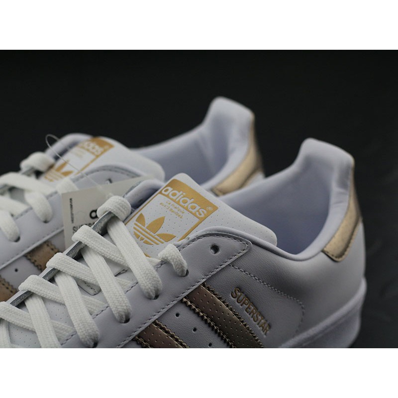 adidas superstar gold sneakers