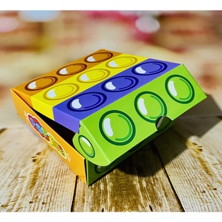 10 caixas para 9 doces pop it páscoa 2025 com berço em Oferta na Shopee