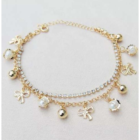 Pulseira Riviera Pingente Laço Love Perolas Folheado A Ouro