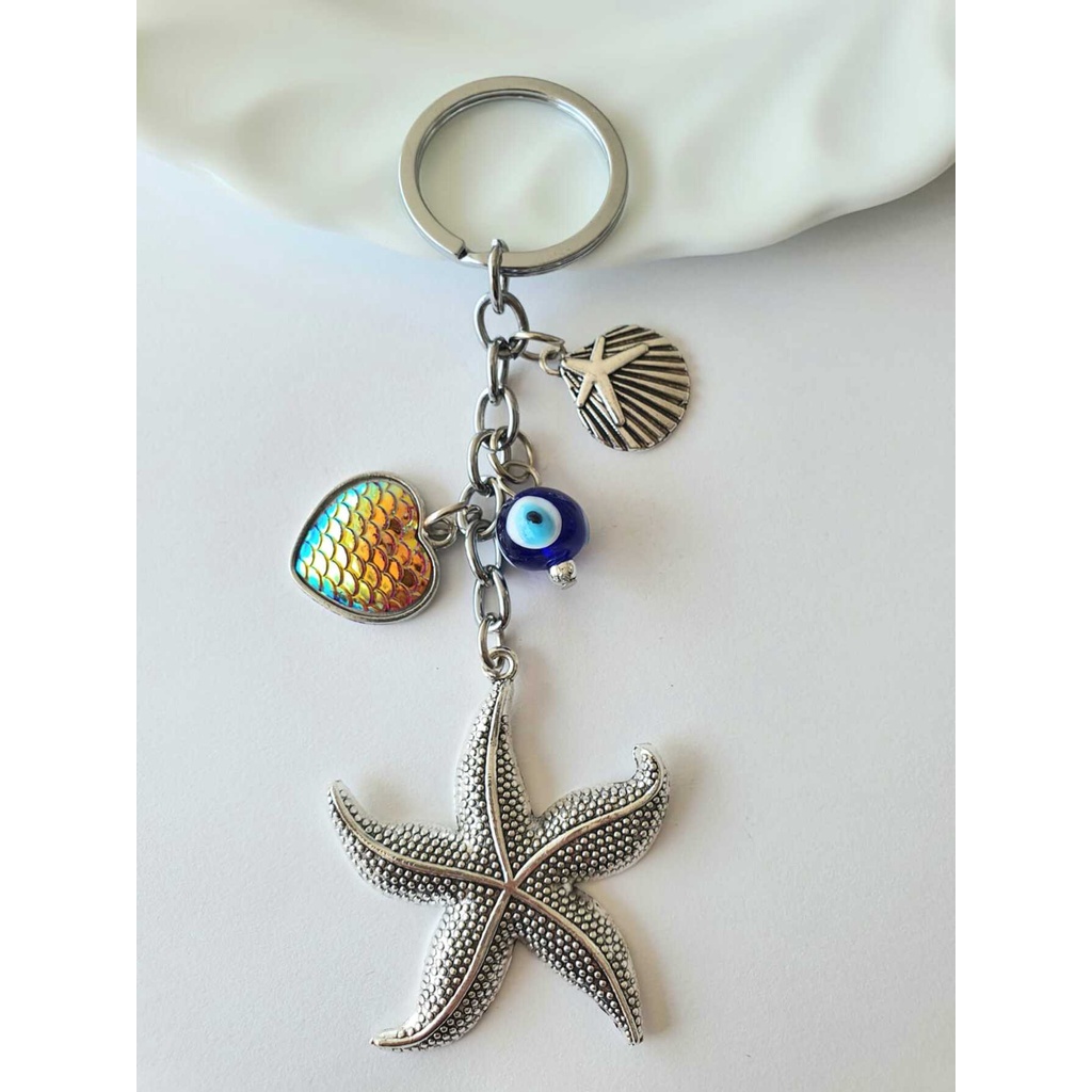 Chaveiro De metal Com Estrela Do mar em Oferta na Shopee