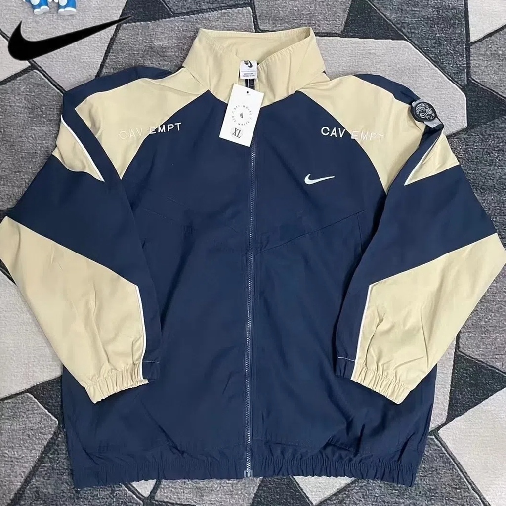 Nike X CAVEMPT Co-branded Men's Bordado Logotipo Corta-Vento Esportes Casual Impermeável Jaqueta