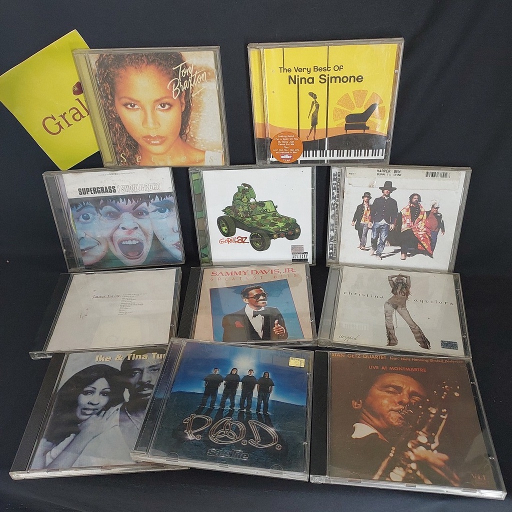 CDs variados valor unitário escolha Ben Harper Christina Aguilera Stan Getz Quartet Ike & Tina Turner Tony Braxton Sammy Davis Jr Supergrass P.O.D. Gorillaz Nina Simone James Taylor