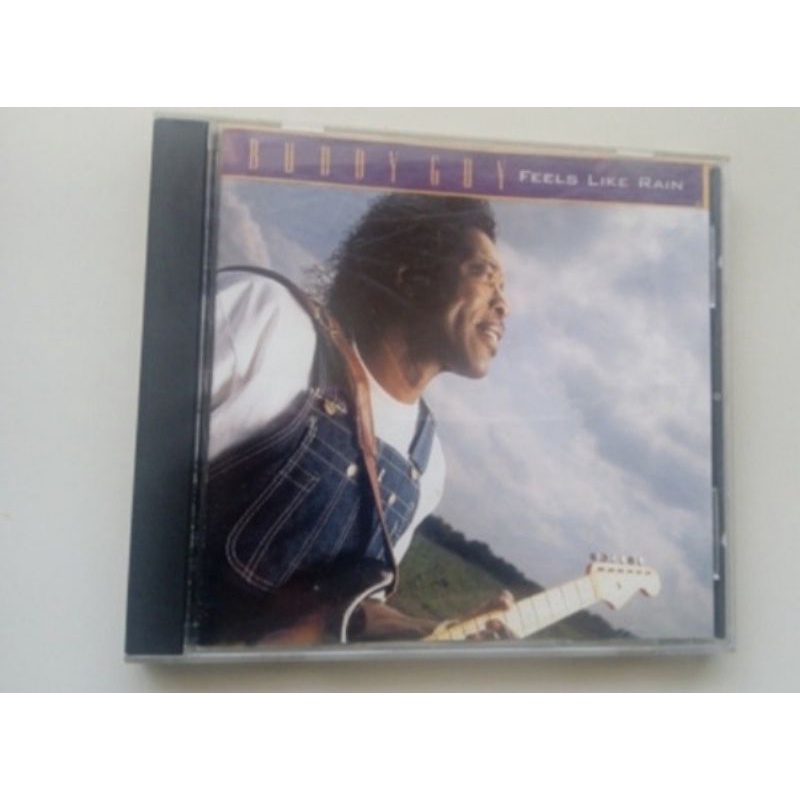 CD buddy guy feels like rain midia com um leve desgaste na borda, mas que funciona perfeitamente