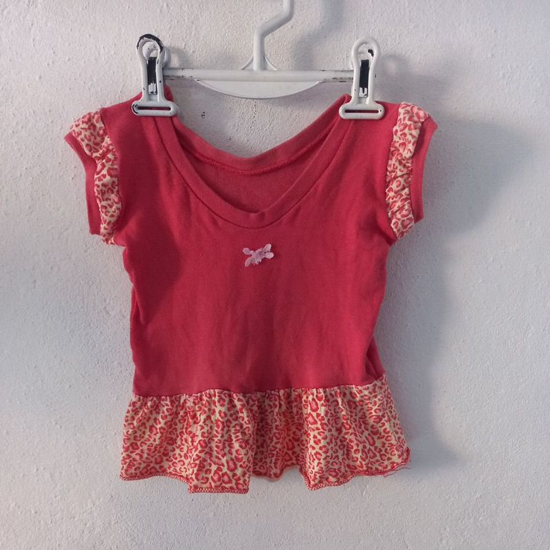 Blusa rosa  de onçinha infantil usada