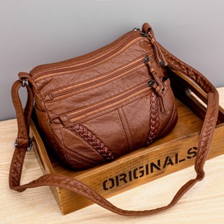 Bolsa de ombro de couro flexível feminina Mochila de viagem feminina
