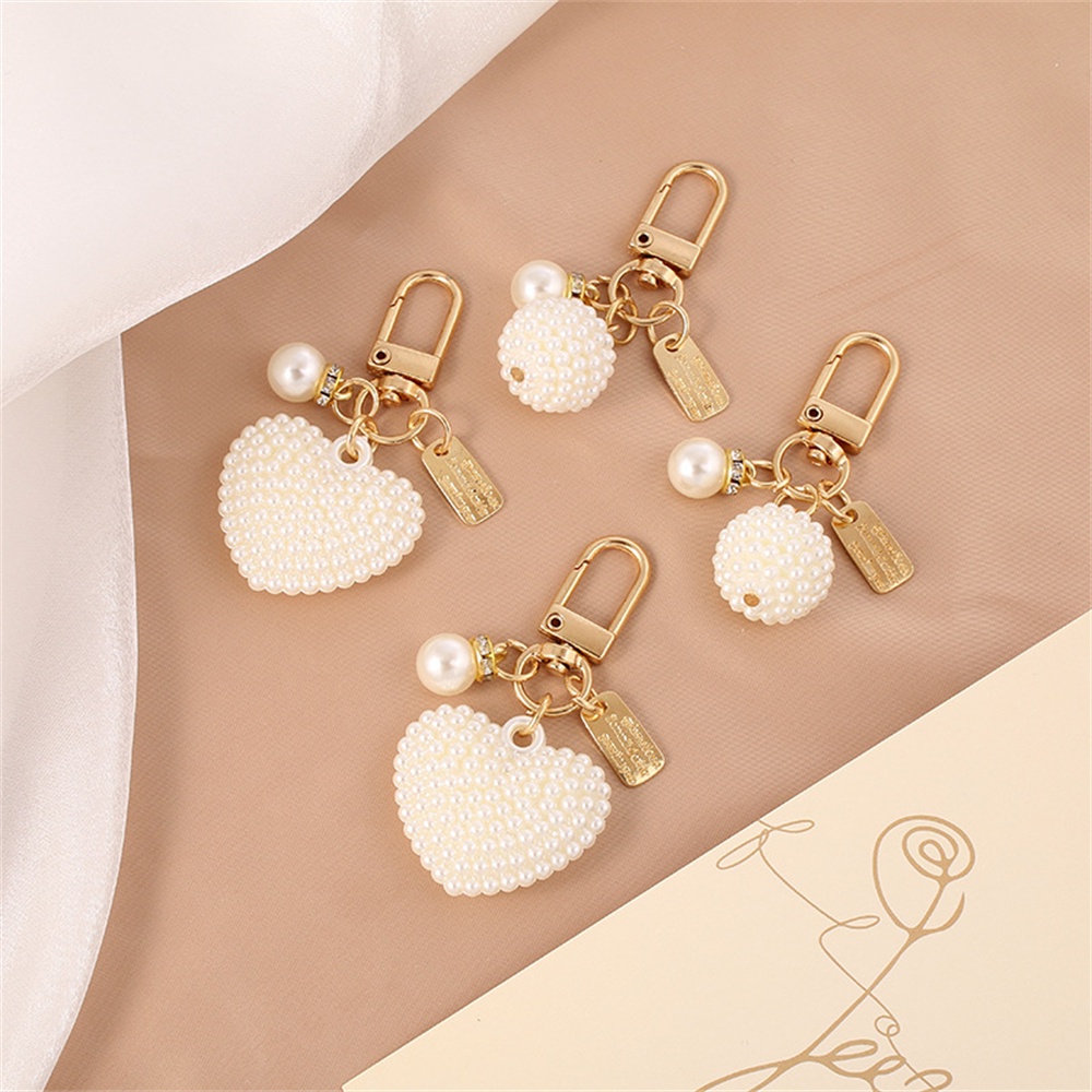 Elegante Porta-Chaves Pearl Heart Chain Fashion Letter Label Mulher Pingentes Fone De Ouvido Deco Acessórios
