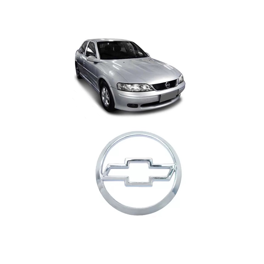 EMBLEMA GRAVATA DA GRADE VECTRA 02/04 CROMADO