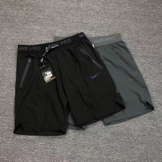 2023 Novo NK Shorts De Secagem Rápida Estilo De Calções De Seda De Verão Homens De Secagem Rápida Corrida Solta Casual De Treinamento